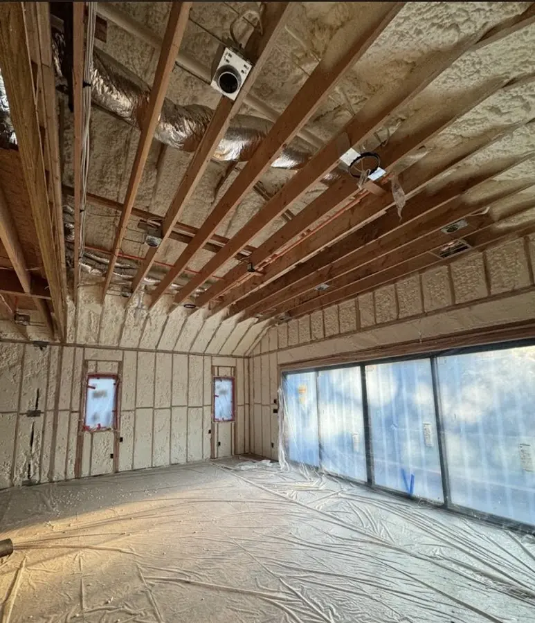 Interior walls and ceiling insulated with spray foam during new construction in Ilchester